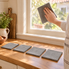 Clarity Glass Cloth Set story: Clarity five-cloth set beside a kitchen window in morning light