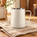 Cream Milk Pitcher hero: Cream Milk Pitcher: whole cream-white pouring pitcher