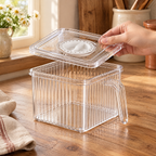 Crisp Small Produce Box use: Hand holding the single lid just above the empty box