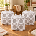 Cushion Shoe Bag Trio hero: Cushion’s exact three white padded-mesh bags