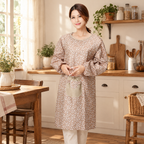 Flora Sleeved Apron hero: Flora’s full sleeves, floral print and front pocket
