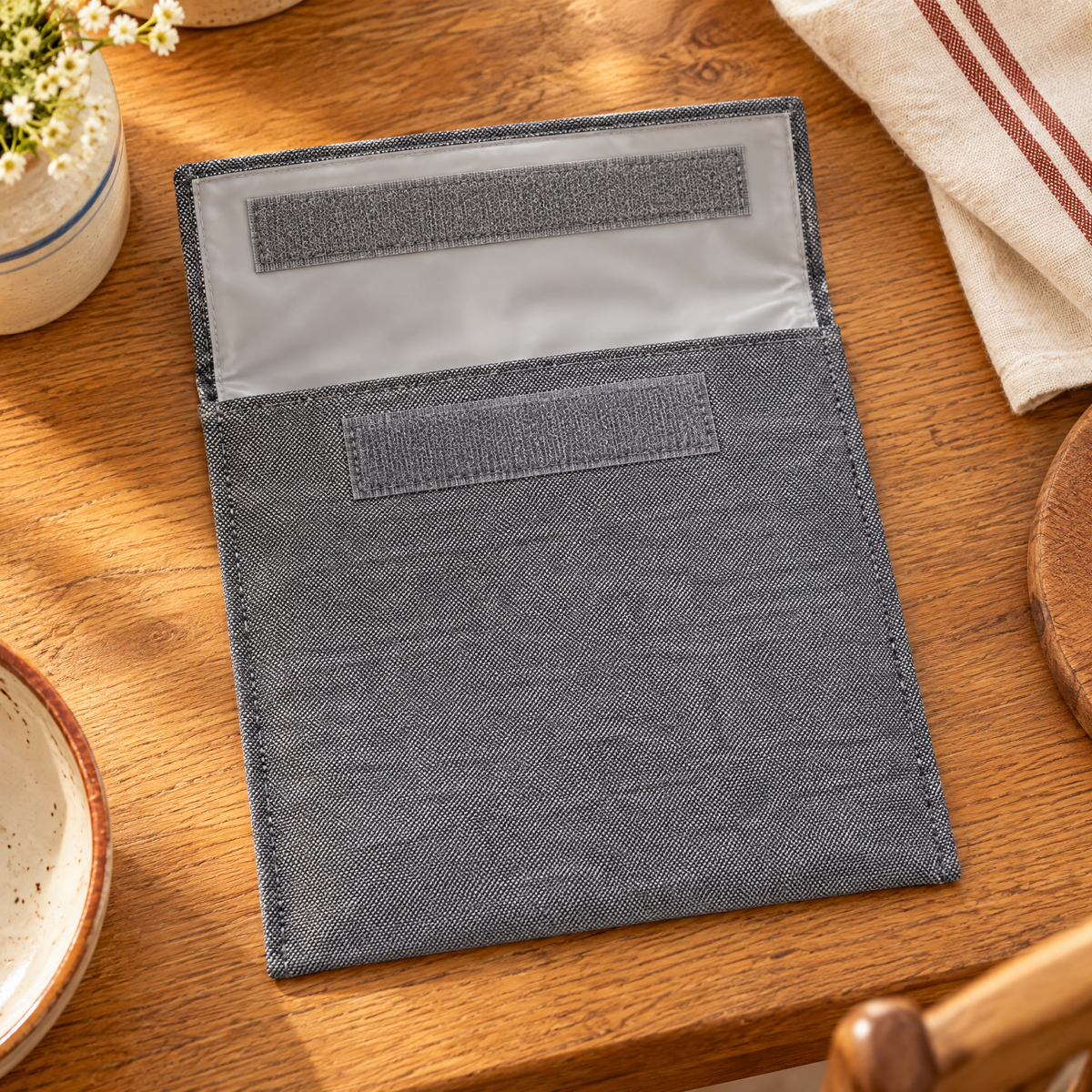 Fold Sandwich Pouch detail: The whole open Fold pouch showing pale lining and matching fastening bands