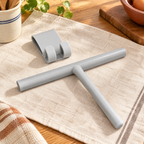 Glide Silicone Glass Squeegee hero: Glide grey silicone squeegee and one matching hook