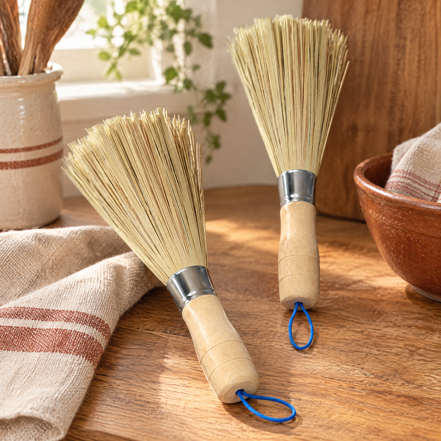Wooden grip, metal collar and pale fan bristles of the Kindred brush pair