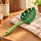 Leaf Pasta Serving Spoon detail: Leaf Pasta Serving Spoon: leaf form and drainage holes