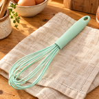 Mint Silicone-Covered Whisk hero: Mint light-green manual balloon whisk