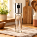 Mist Glass Oil Sprayer hero: Mist Glass Oil Sprayer: the empty glass bottle and manual pump
