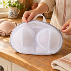 Petal Bra Wash Bag use: One Petal bag being opened gently by hand