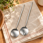 Salad Stainless Serving Pair detail: The solid spoon and two-slotted fork heads of the complete Salad pair