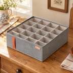 Tuck Twenty-Cell Drawer Organiser detail: Tuck twenty fabric cells and actual orange front tab