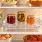 Turn Rectangular Fridge Organiser story: Three light closed jars on a clear rectangular tray