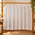 Veil Garment Cover Set hero: Veil’s six exact white-edge garment covers