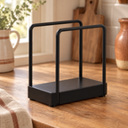 Welcome Napkin Holder detail: Close view of Welcome’s open black wire sides and flat rectangular base